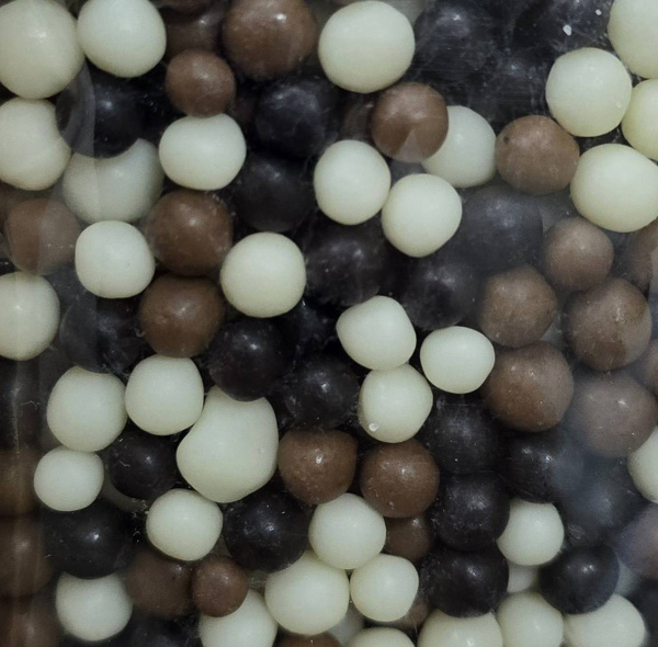 Шарики Криспи бел/тем/мол из конд. глазури 50гр